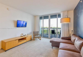 2 Bed 2 Bath at Beachwalk with Luxury Pool and Gym